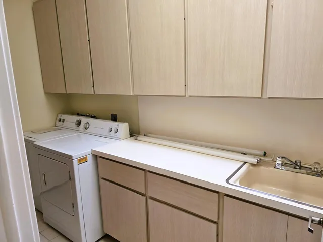a utility room with a sink