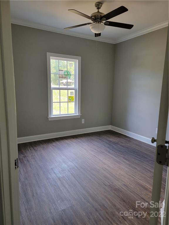 970 Miles Road Dallas, NC 28034 - Photo 14 of 15 wooden floor in an empty room with a window