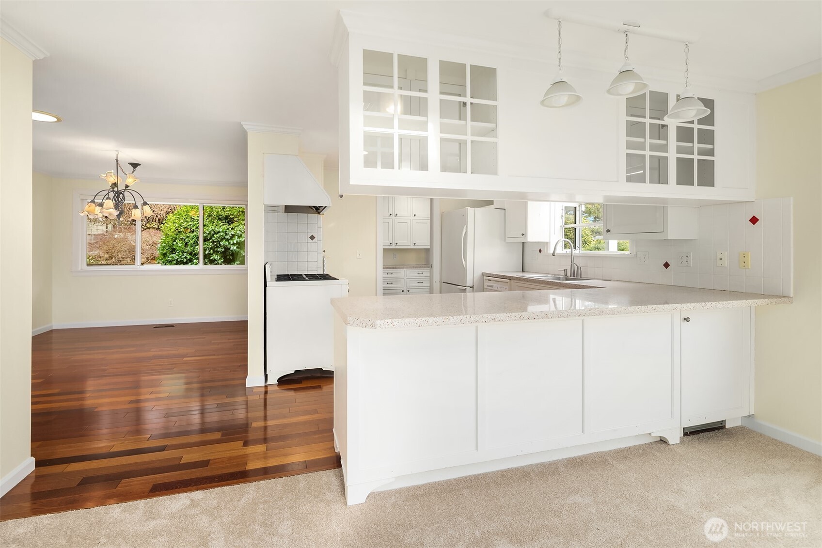 103 West Rivmont Drive Monroe, WA 98272 - Photo 13 of 34 a kitchen with cabinets and window