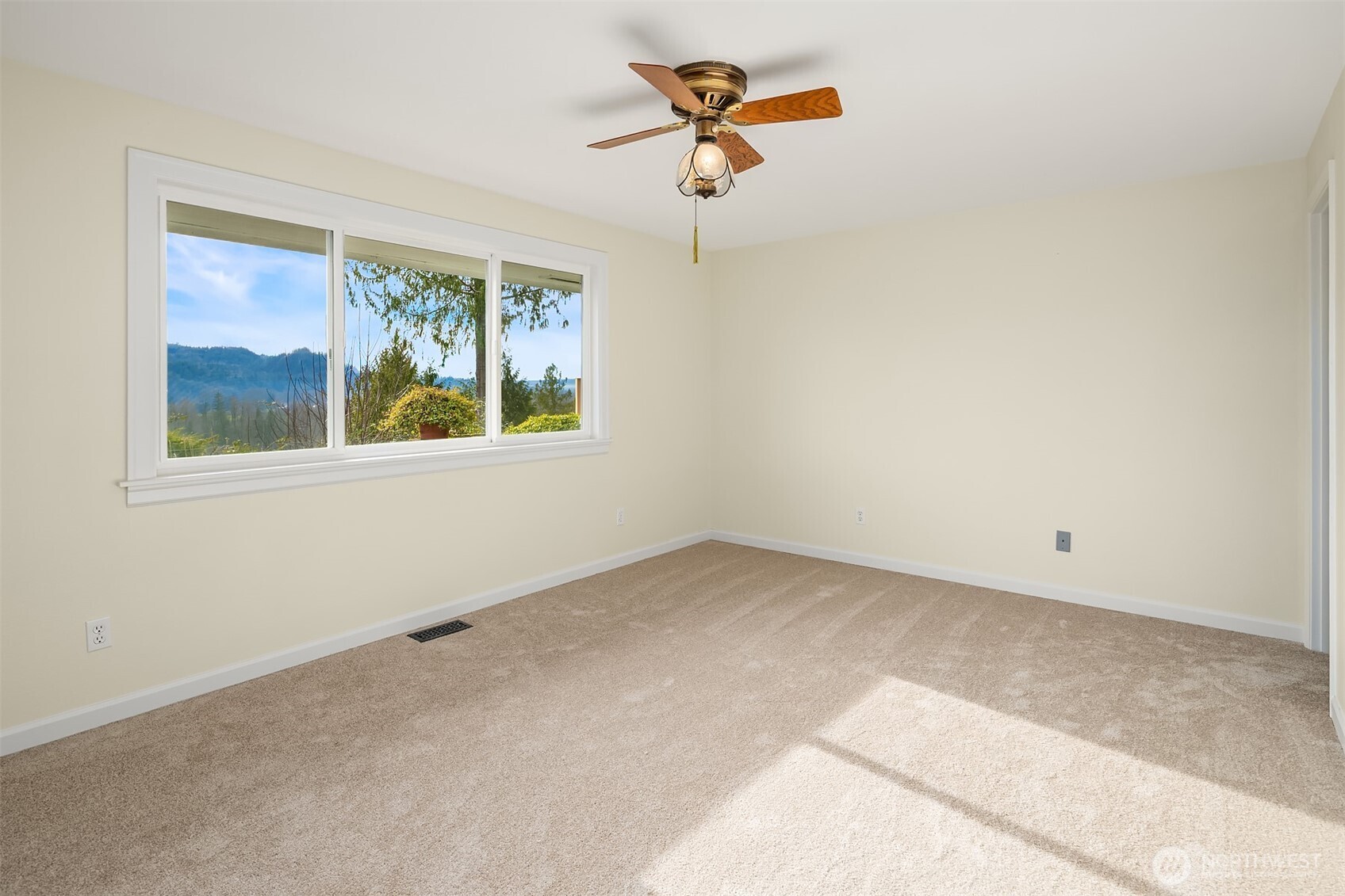 103 West Rivmont Drive Monroe, WA 98272 - Photo 16 of 34 an empty room with a window