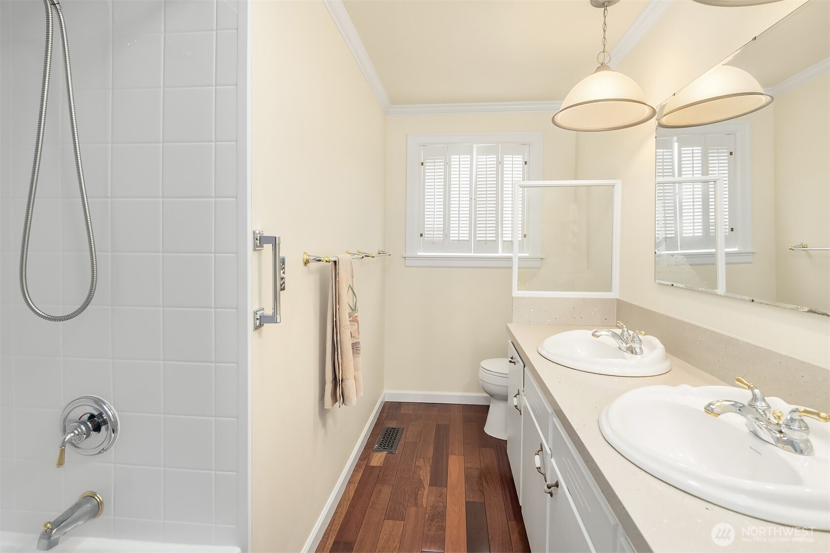 103 West Rivmont Drive Monroe, WA 98272 - Photo 22 of 34 a bathroom with a sink a mirror and a shower