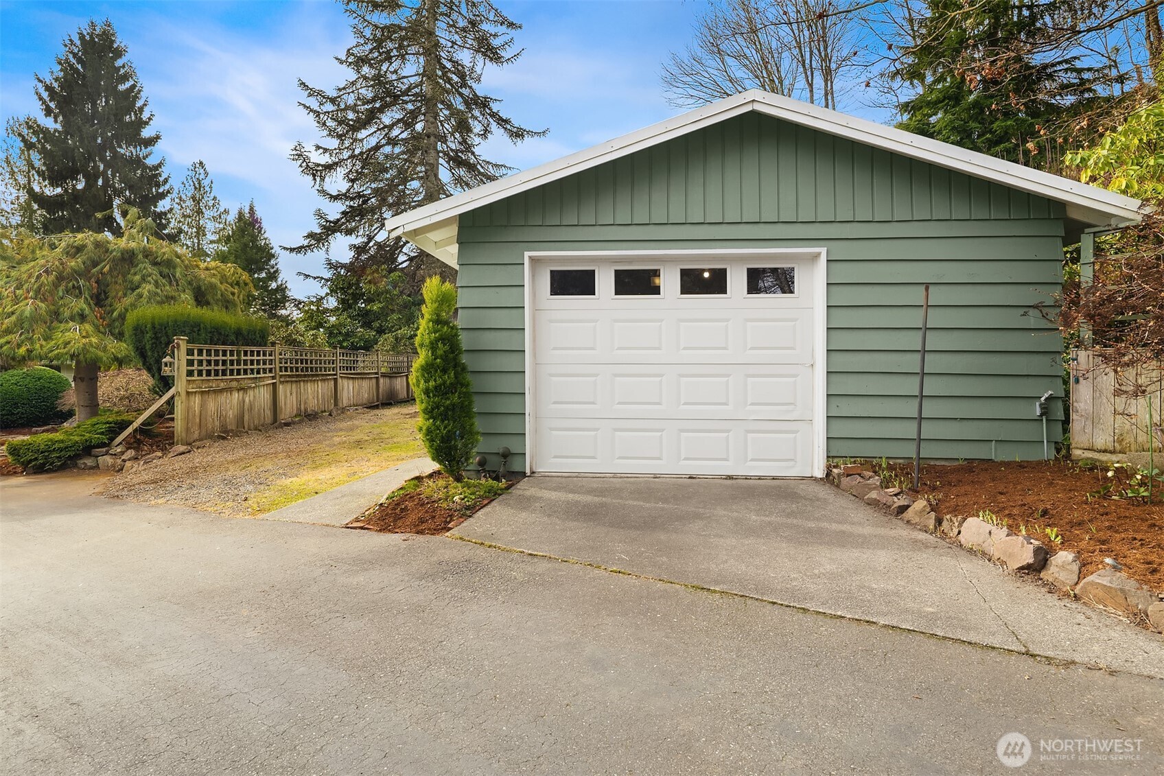 103 West Rivmont Drive Monroe, WA 98272 - Photo 29 of 34 a view of backyard of house with wooden fence