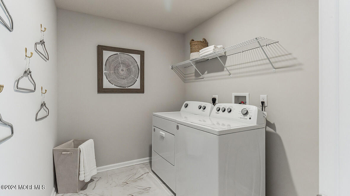21 Victoria Gdns Square Neptune, NJ 07753 - Photo 10 of 20 a utility room with dryer and washer