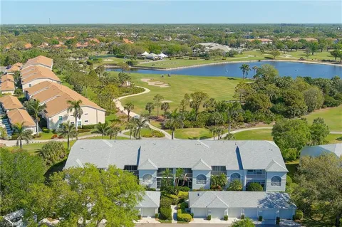 an aerial view of a house with a ocean view