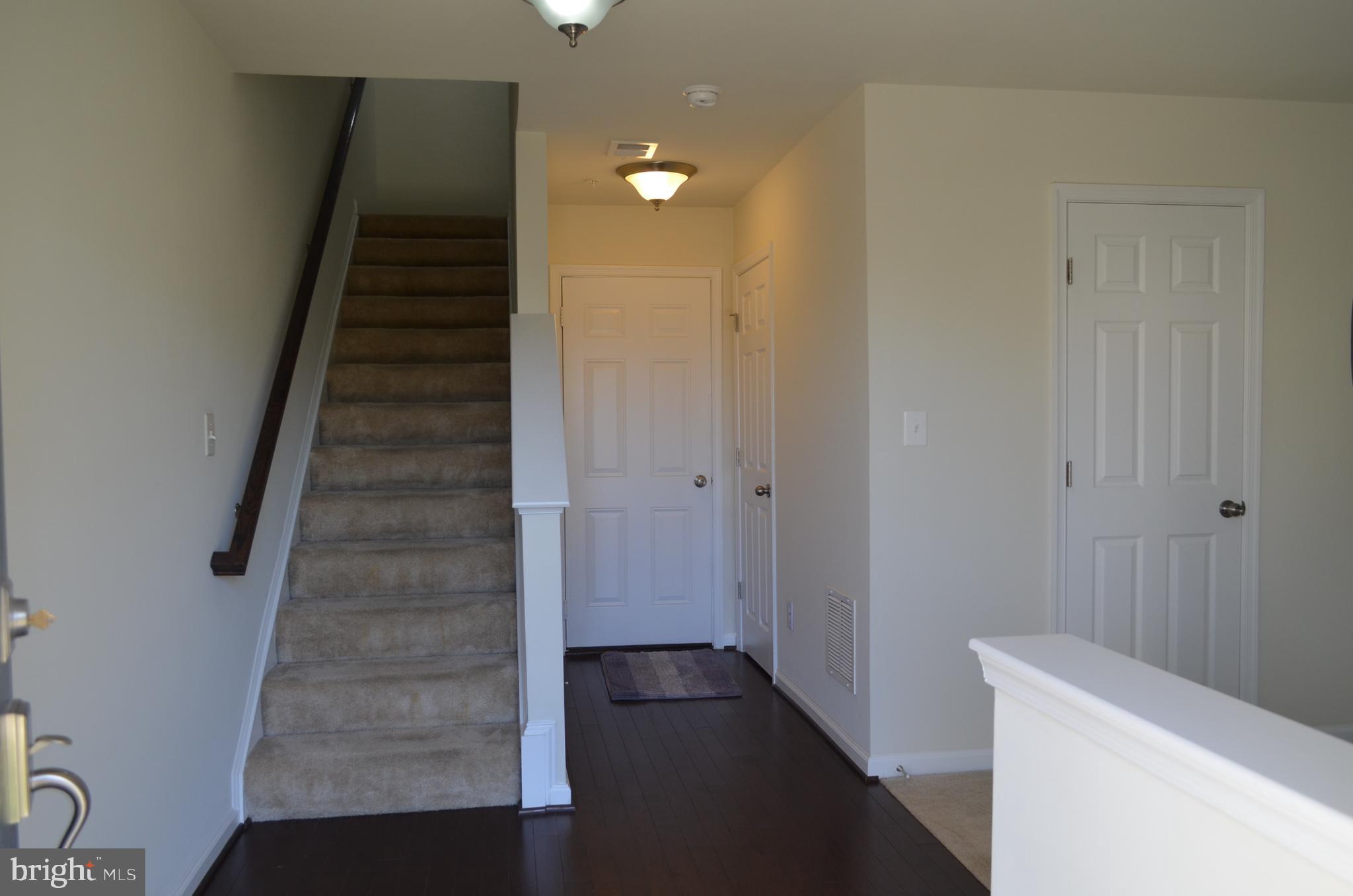 6004 Forum Frederick, MD 21703 - Photo 11 of 30 a view of hallway with stairs