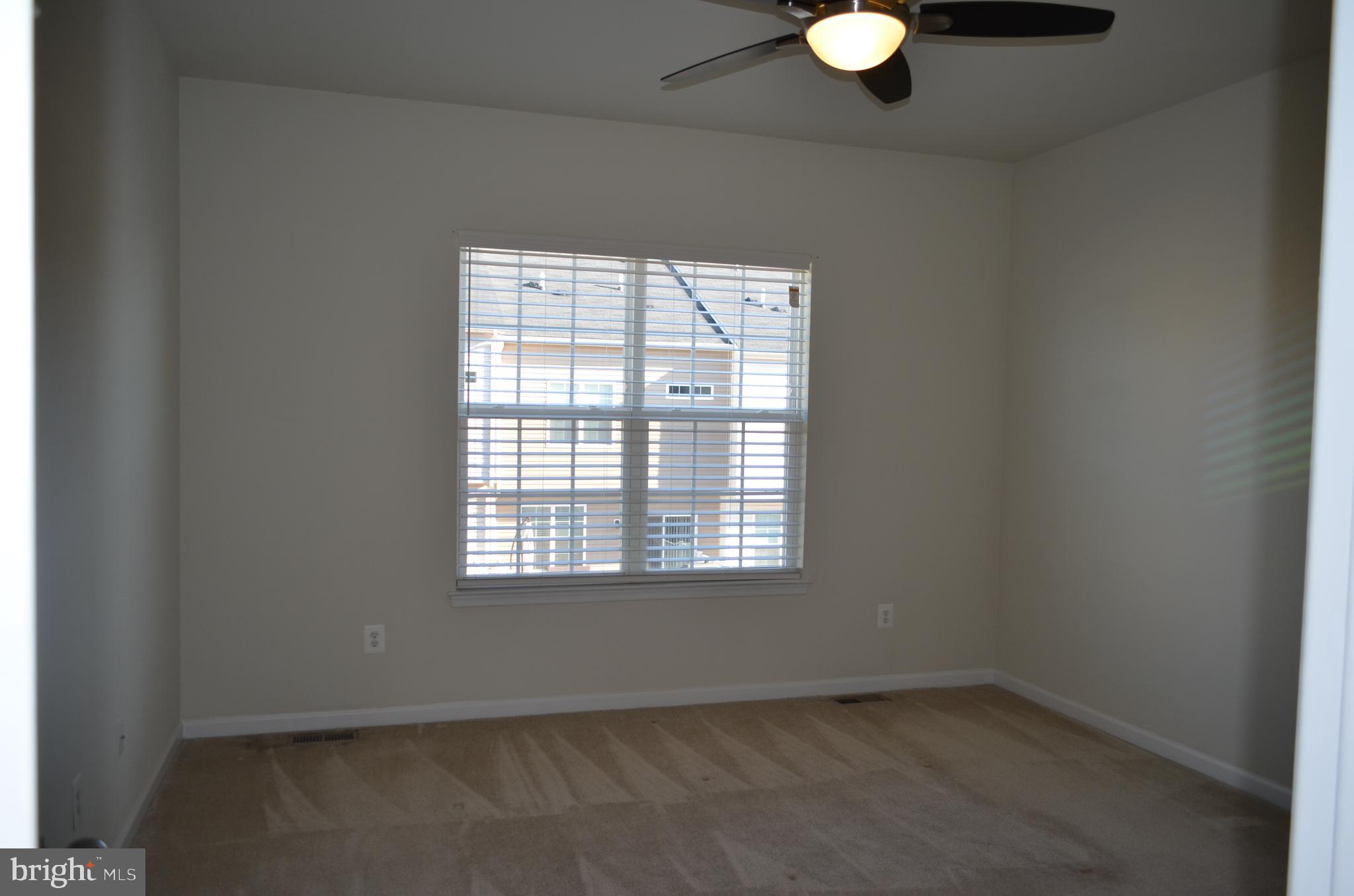 6004 Forum Frederick, MD 21703 - Photo 15 of 30 an empty room with a window