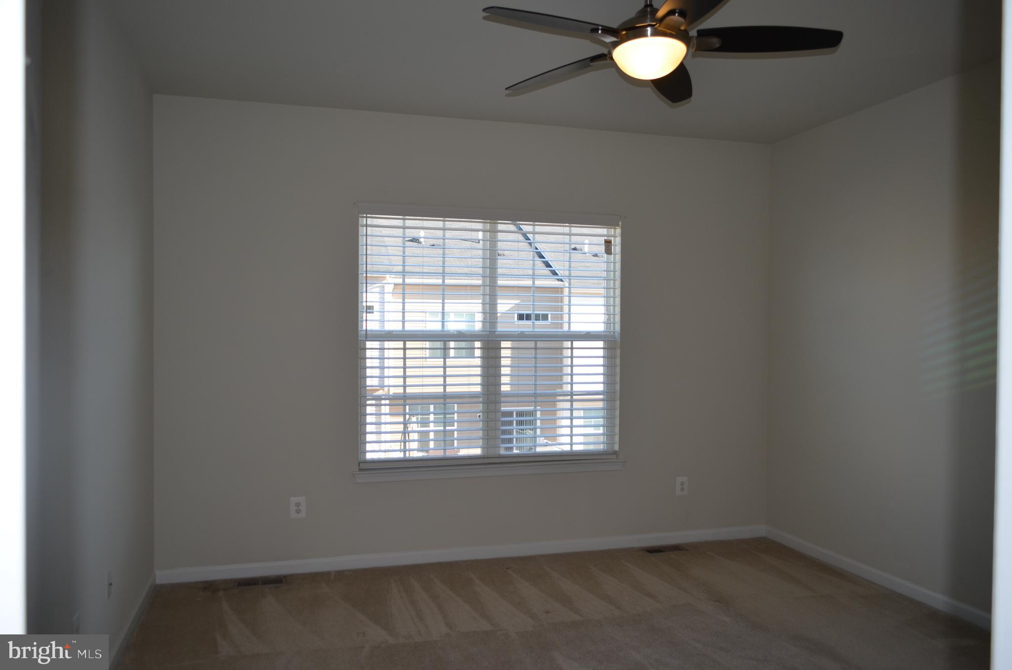 6004 Forum Frederick, MD 21703 - Photo 16 of 30 an empty room with a window