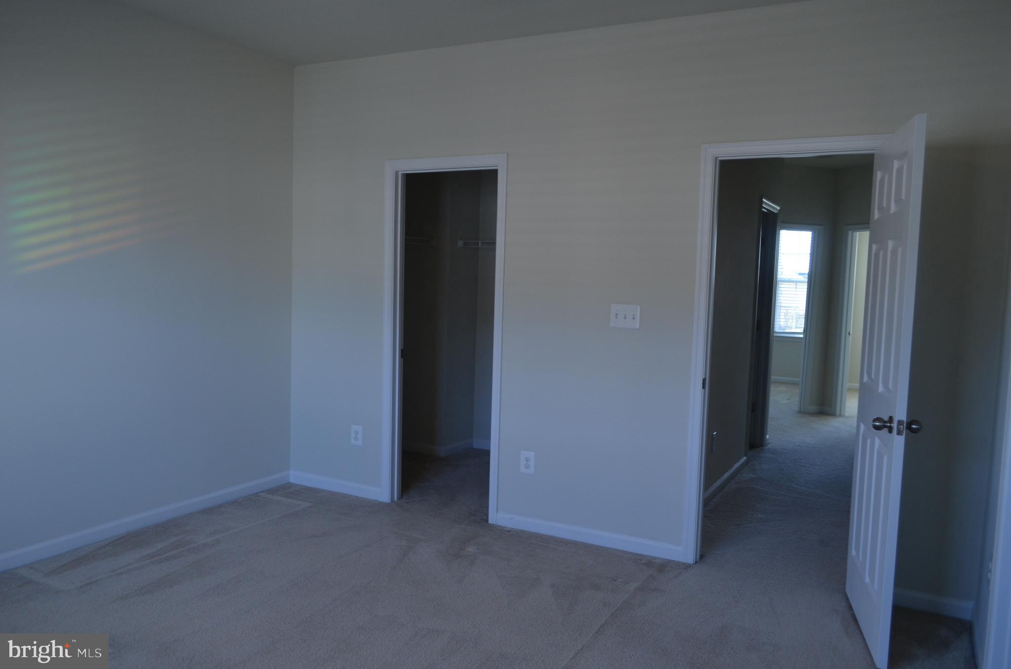 6004 Forum Frederick, MD 21703 - Photo 19 of 30 an empty room with closet