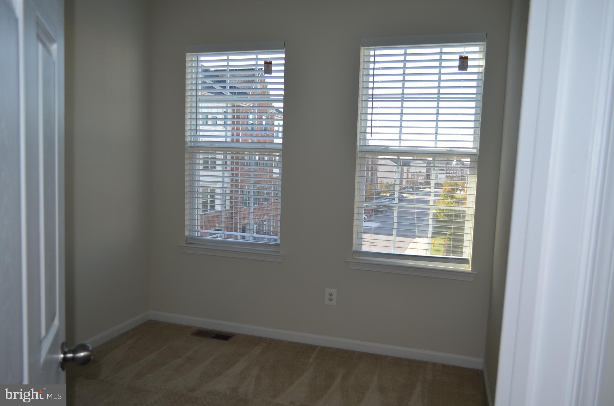 6004 Forum Frederick, MD 21703 - Photo 24 of 30 an empty room with a window