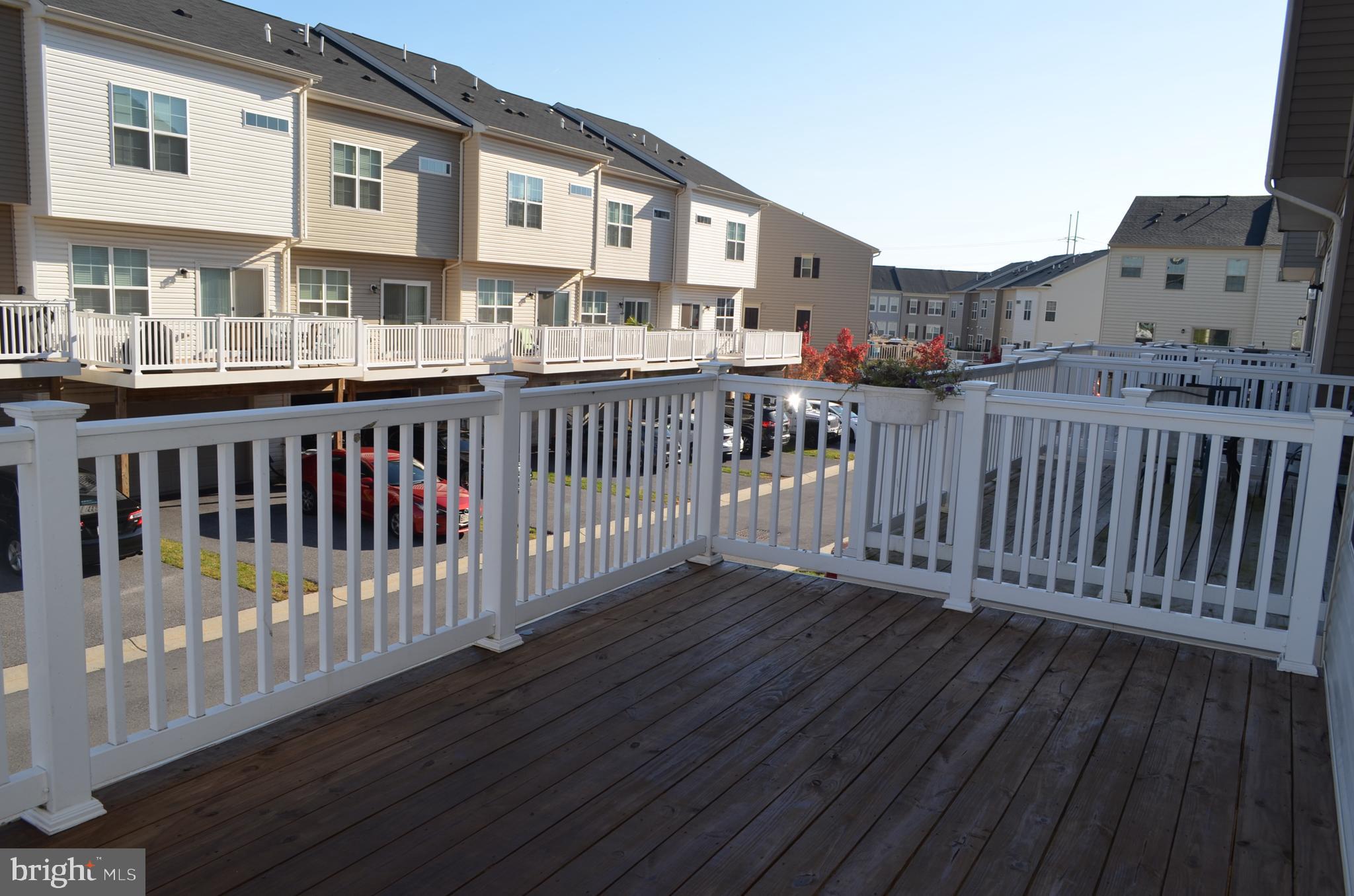 6004 Forum Frederick, MD 21703 - Photo 25 of 30 a view of a brick building from a deck