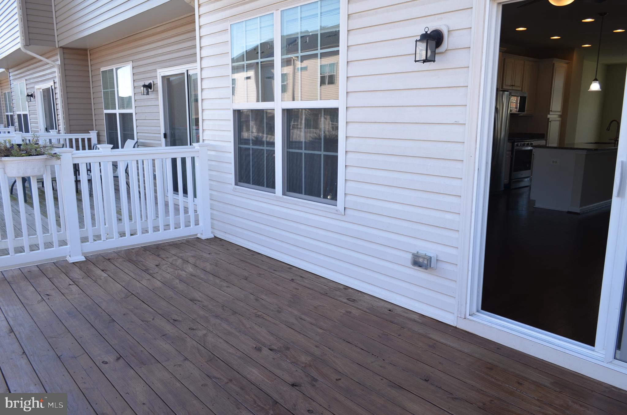 6004 Forum Frederick, MD 21703 - Photo 26 of 30 a view of a house with wooden floor