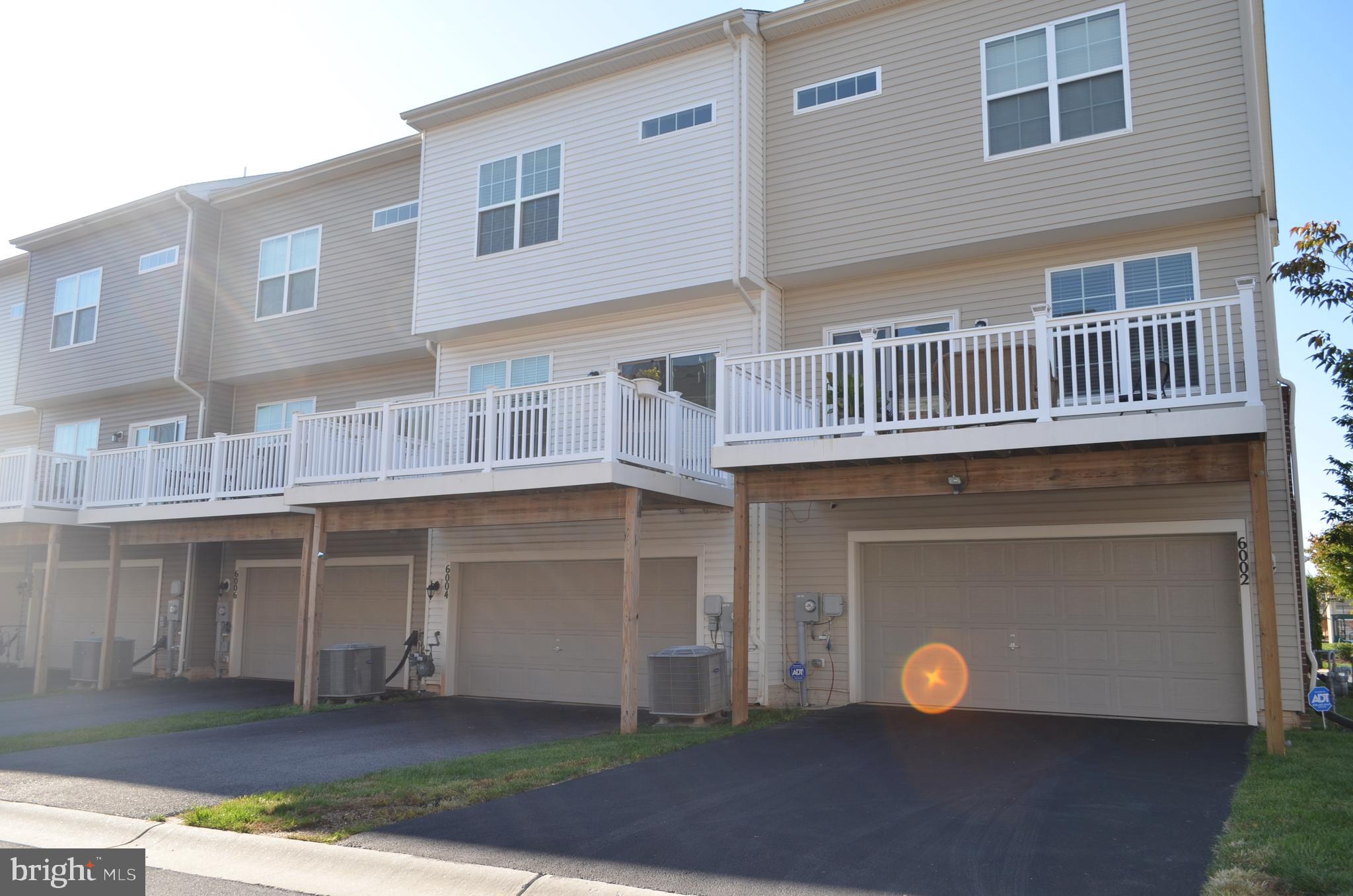 6004 Forum Frederick, MD 21703 - Photo 28 of 30 a front view of a house with a space