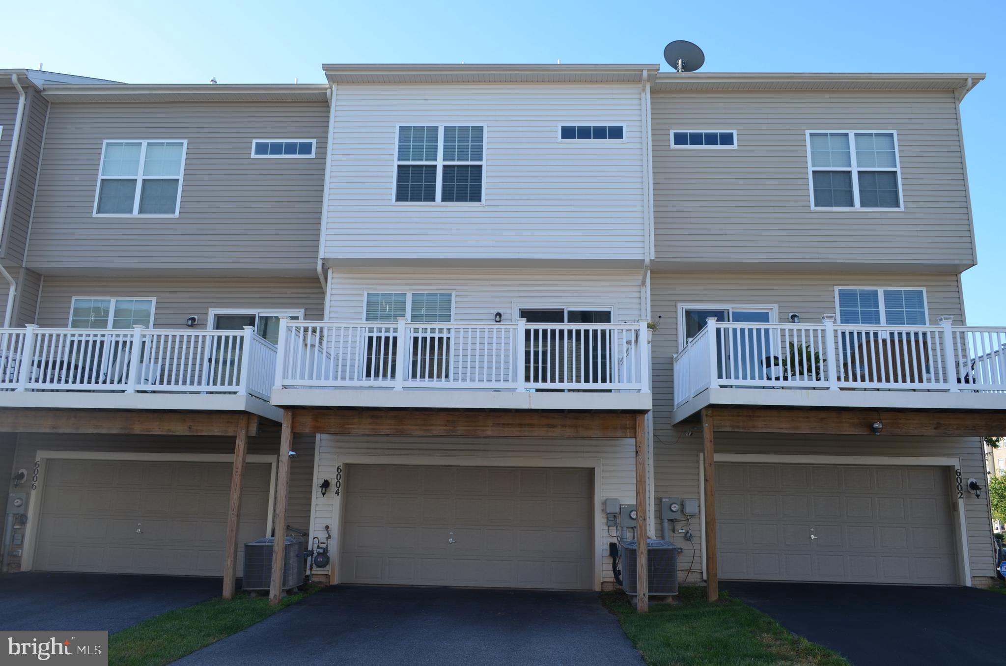 6004 Forum Frederick, MD 21703 - Photo 29 of 30 a kitchen with a stove and a sink