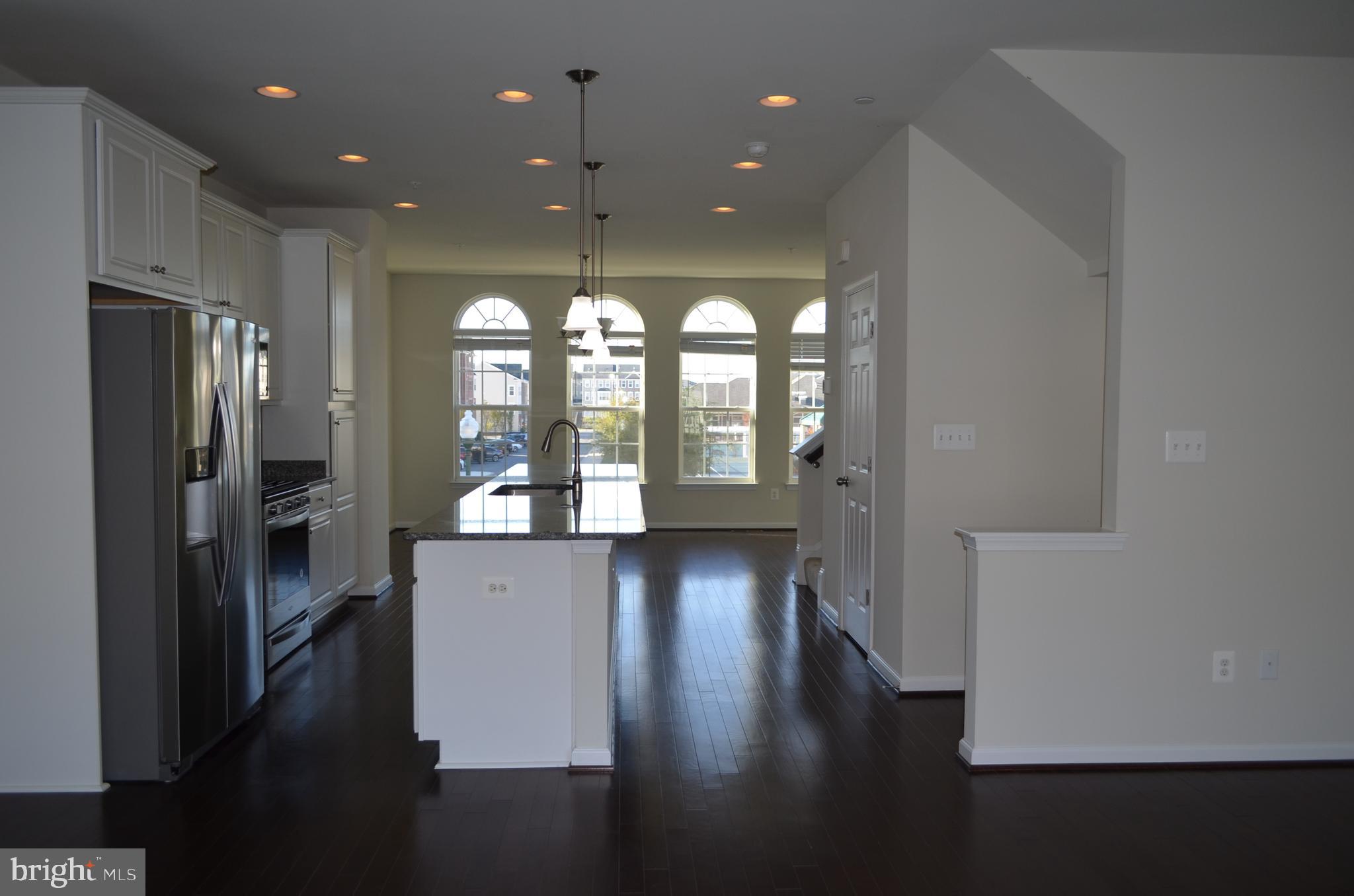 6004 Forum Frederick, MD 21703 - Photo 3 of 30 a view of entryway with wooden floor