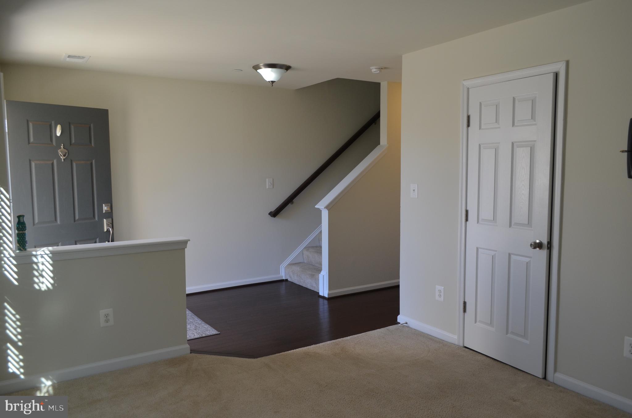 6004 Forum Frederick, MD 21703 - Photo 9 of 30 a view of an empty room with stairs