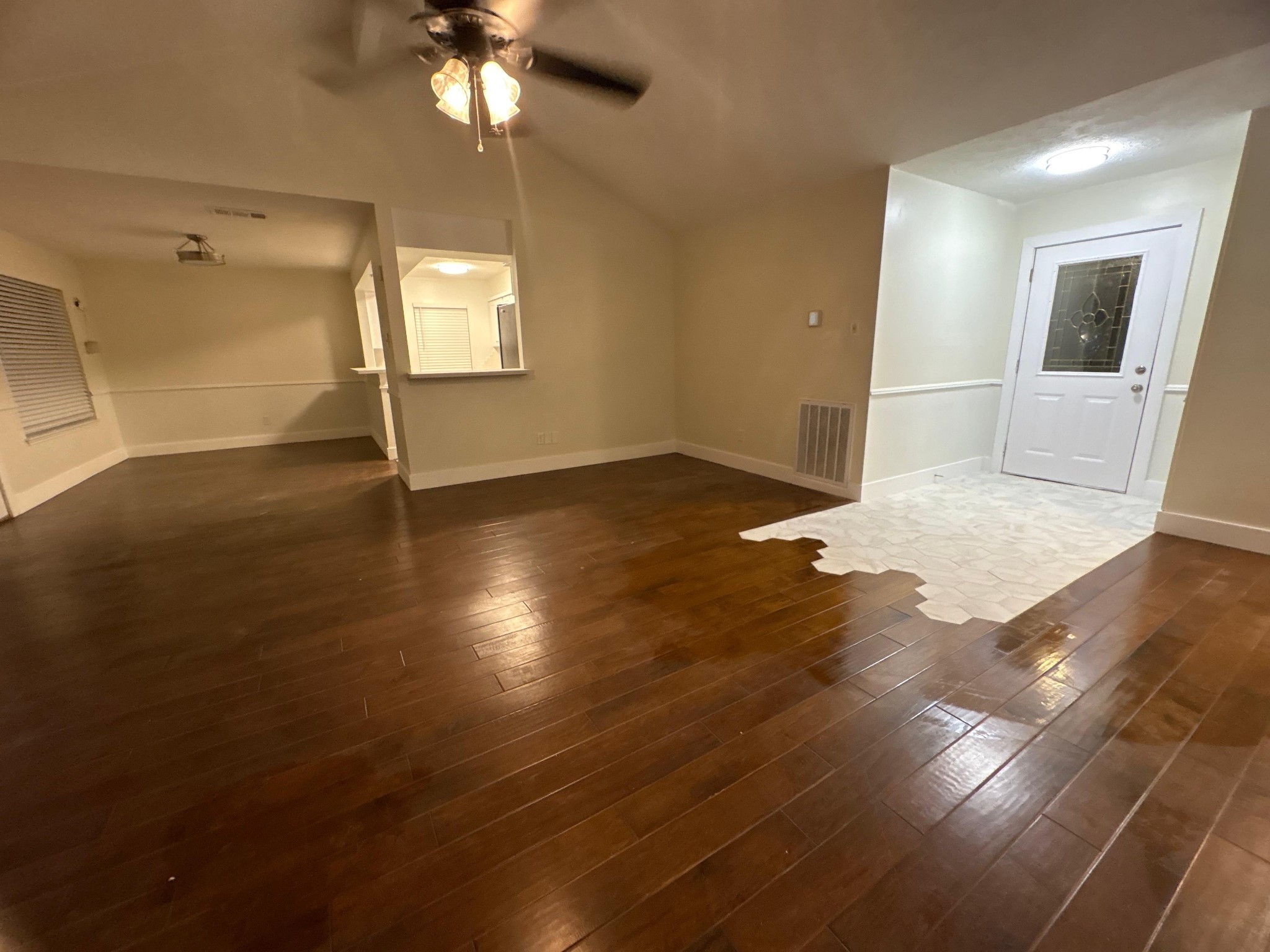 2026 Briar Ridge Drive Rosenberg, TX 77471 - Photo 5 of 10 a view of a livingroom with wooden floor and window