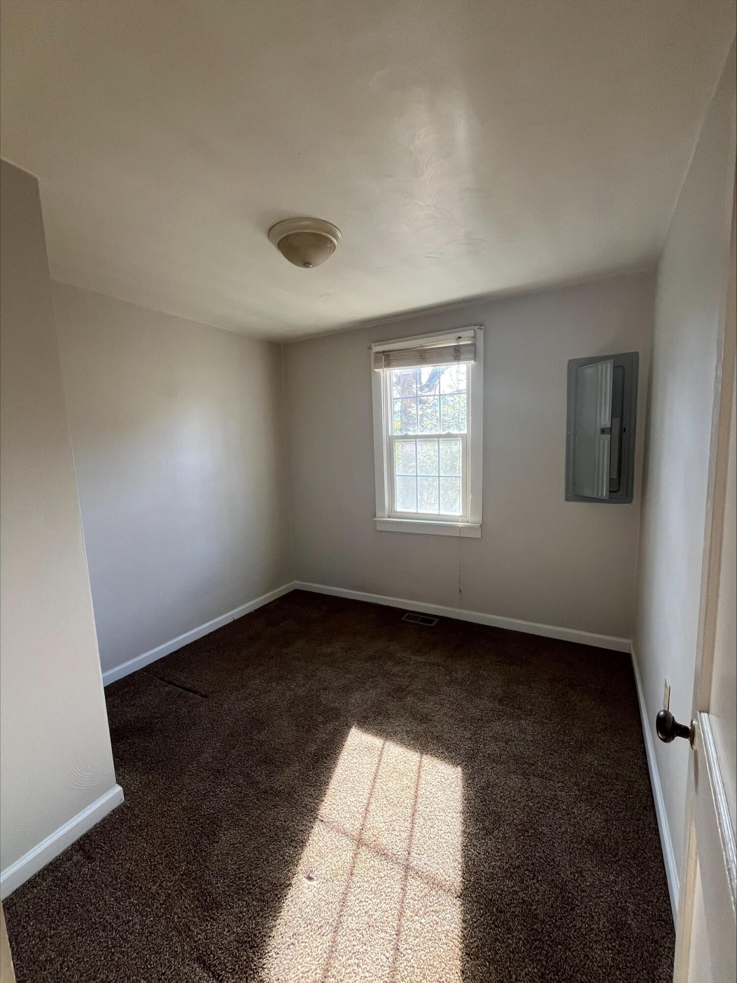 4529 Old Mountain Road Northeast Roanoke, VA 24019 - Photo 11 of 18 wooden floor in an empty room with a window