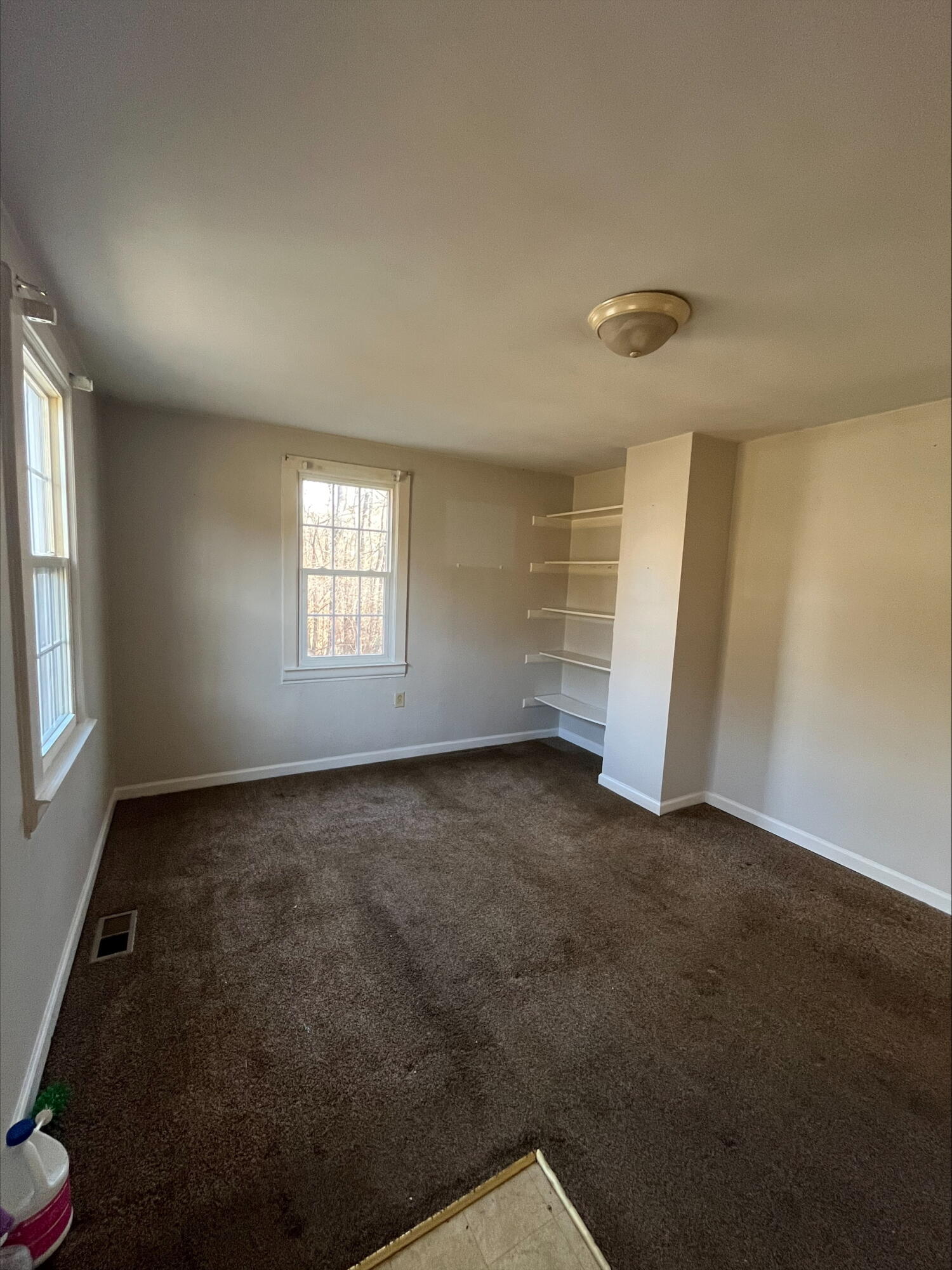 4529 Old Mountain Road Northeast Roanoke, VA 24019 - Photo 14 of 18 an empty room with windows