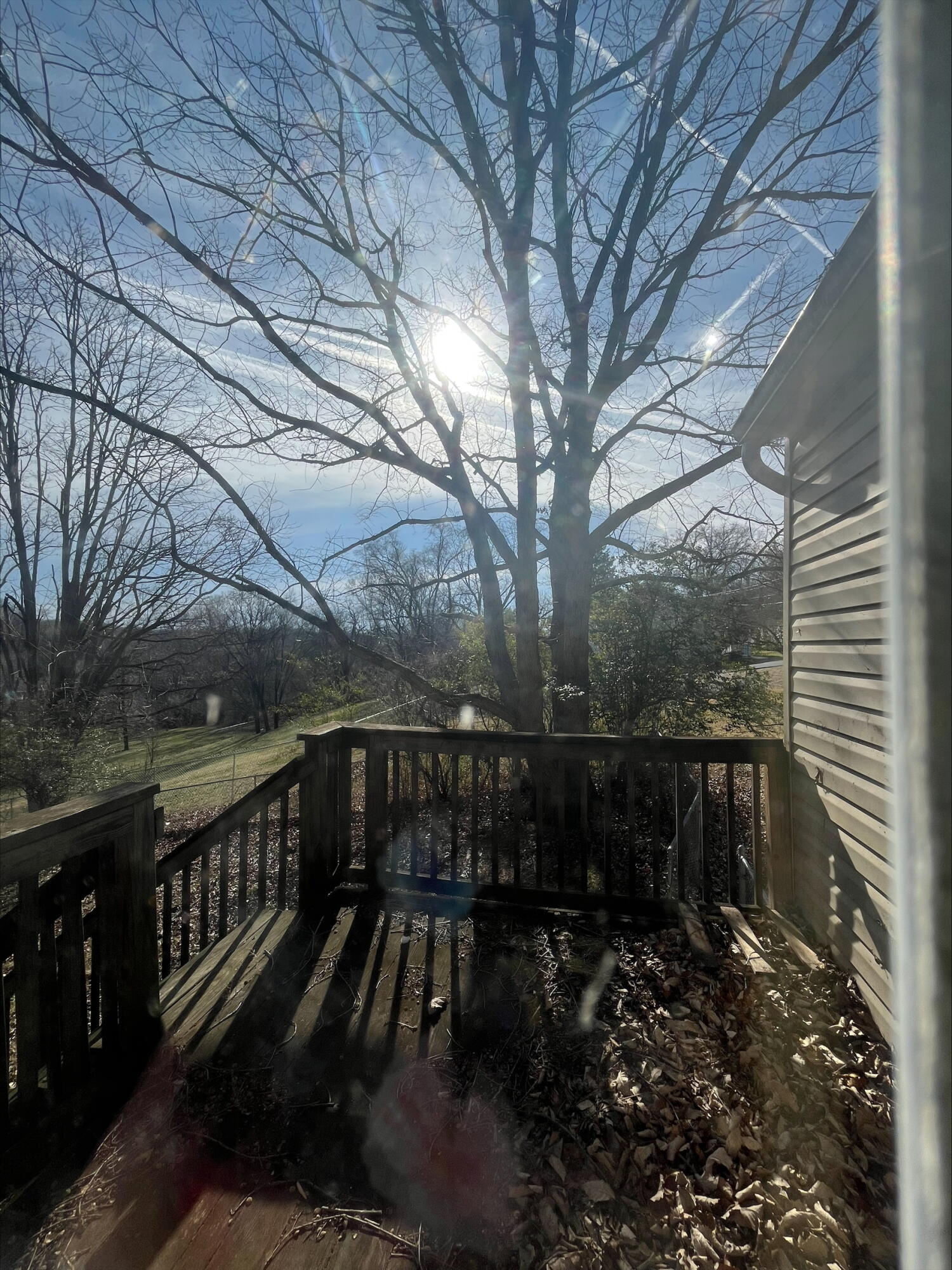 4529 Old Mountain Road Northeast Roanoke, VA 24019 - Photo 17 of 18 a view of balcony with wooden floor and fence and trees