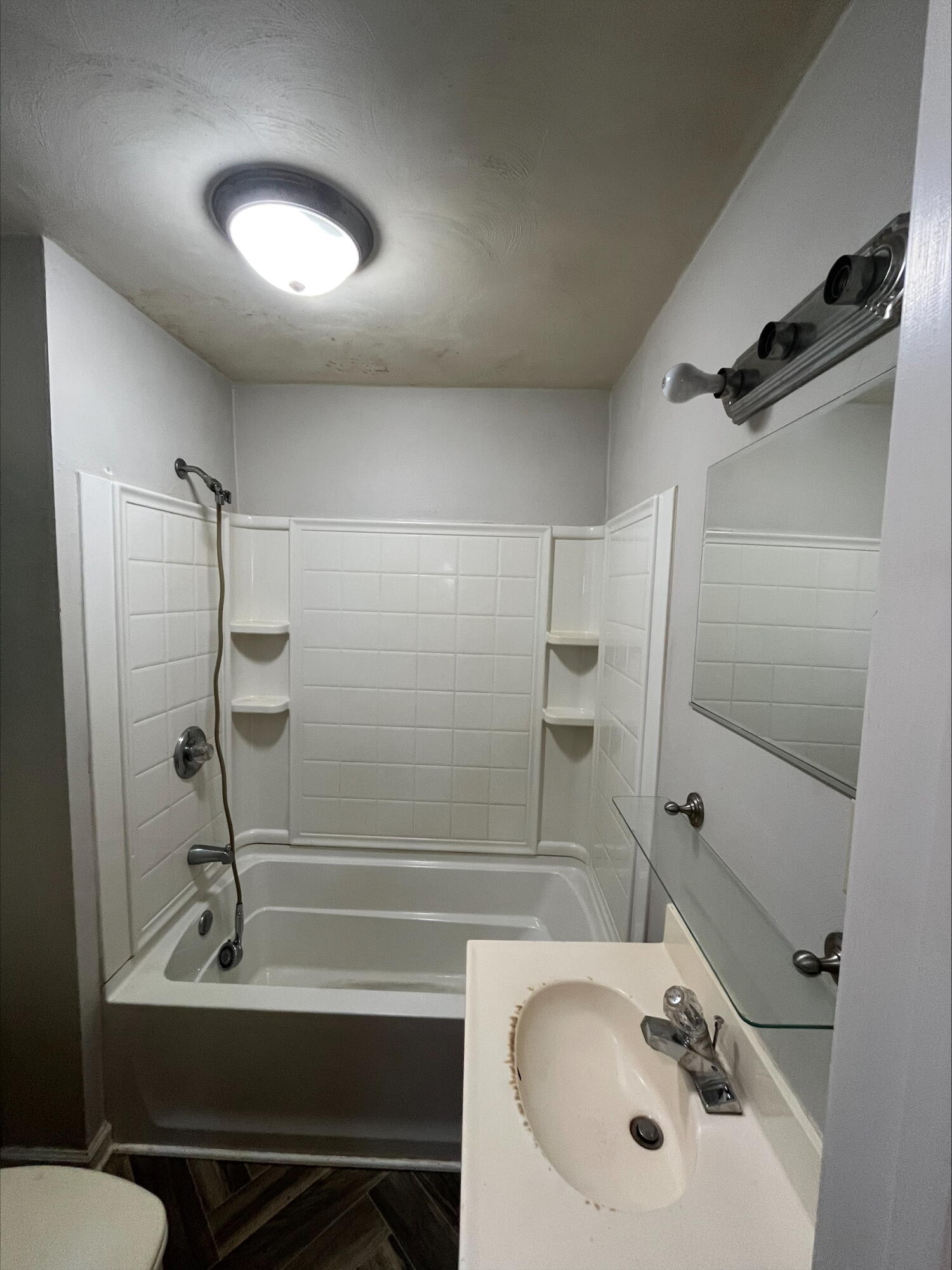 4529 Old Mountain Road Northeast Roanoke, VA 24019 - Photo 10 of 18 a bathroom with a sink toilet and shower
