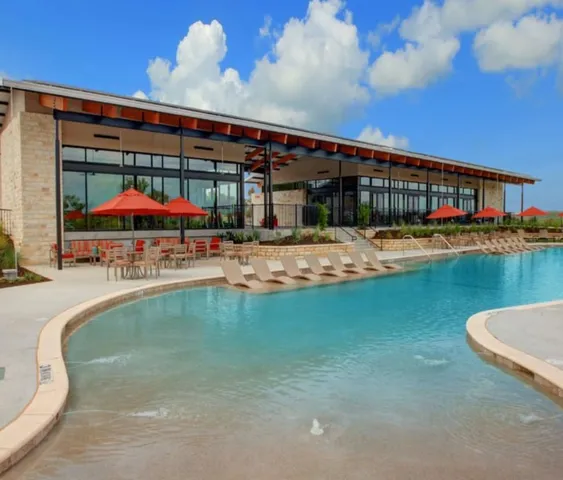 swimming pool view with a outdoor seating
