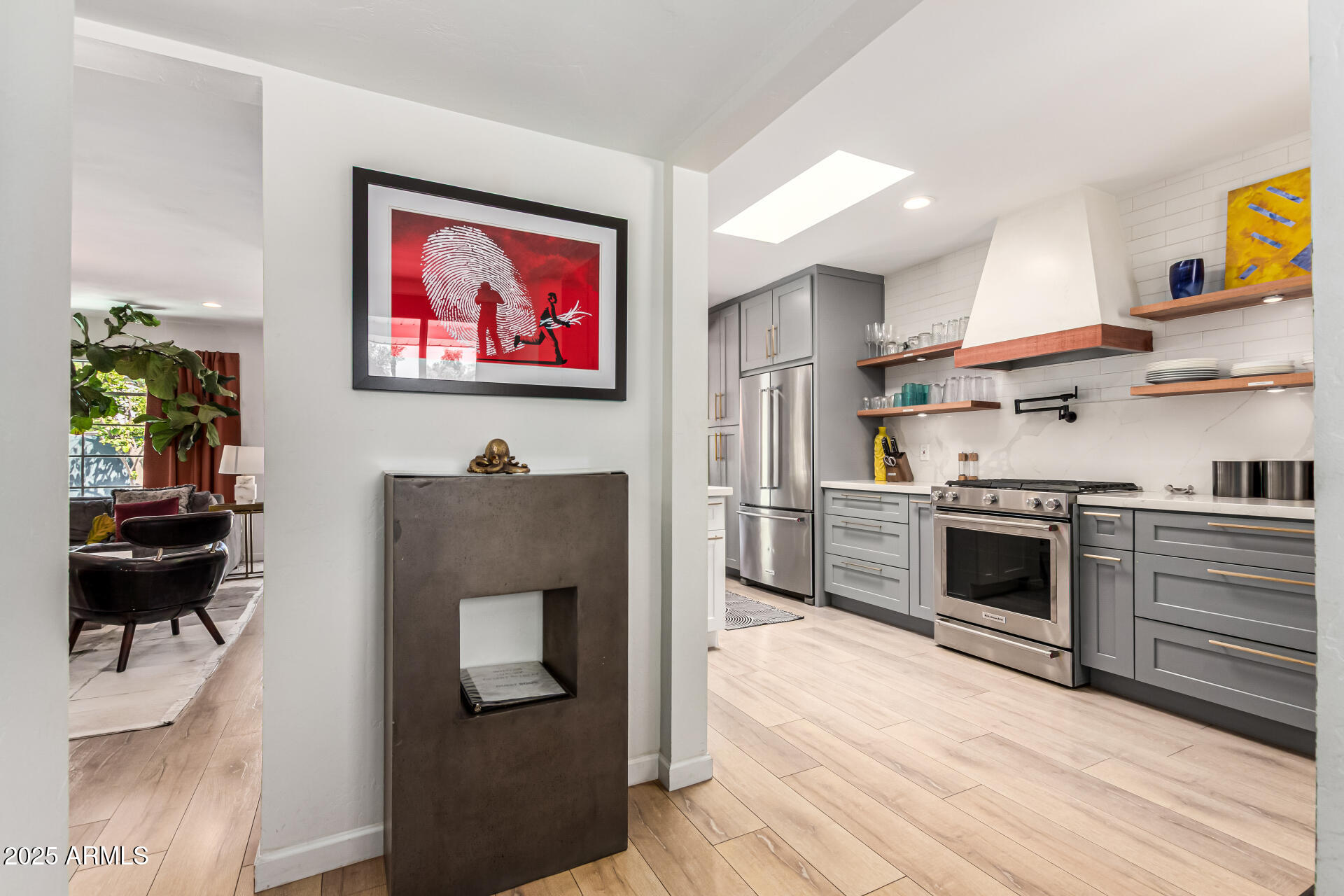 3809 North 35th Street Phoenix, AZ 85018 - Photo 12 of 43 a view of kitchen with kitchen island stainless steel appliances a stove and a refrigerator