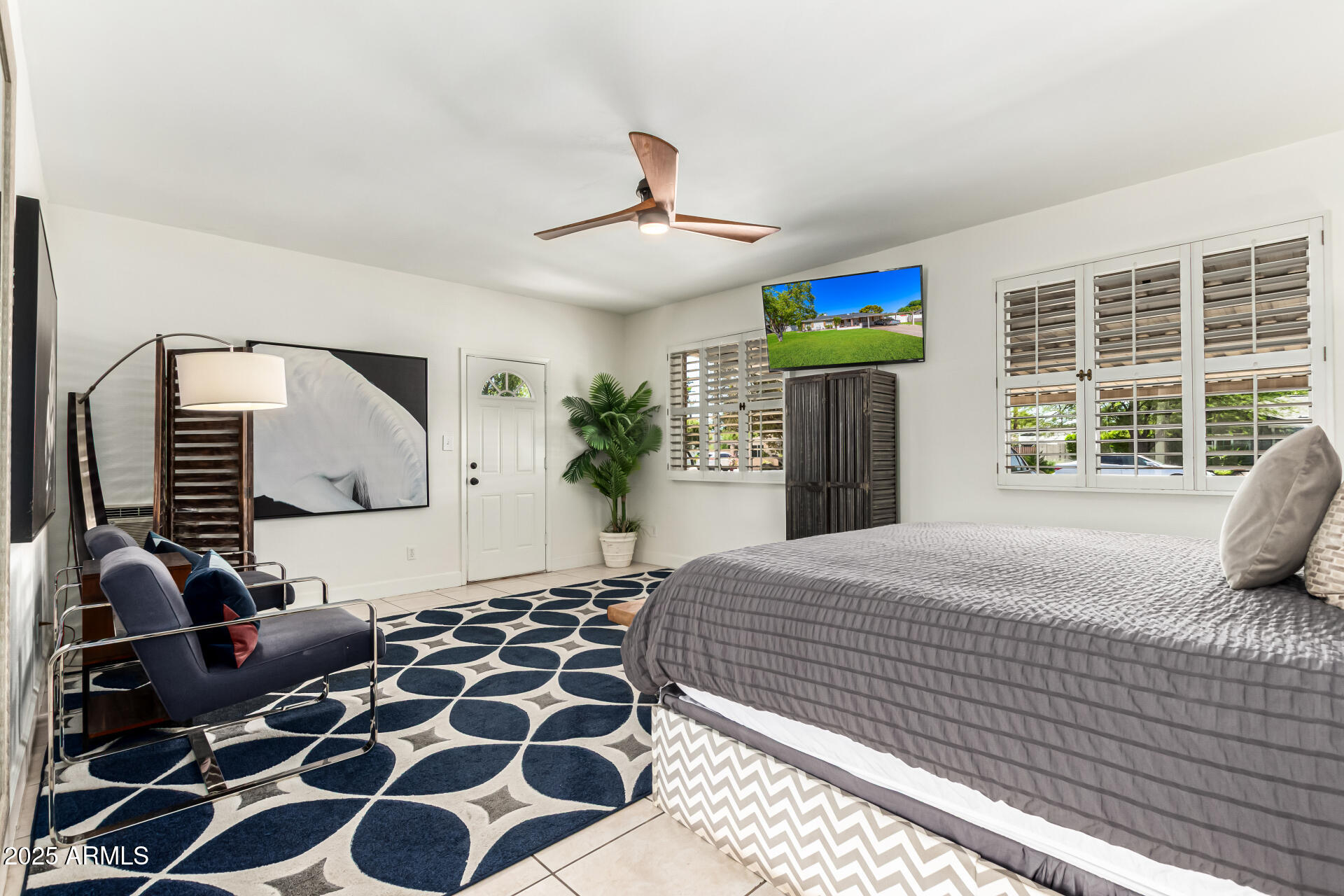 3809 North 35th Street Phoenix, AZ 85018 - Photo 21 of 43 a bedroom with a bed and a window