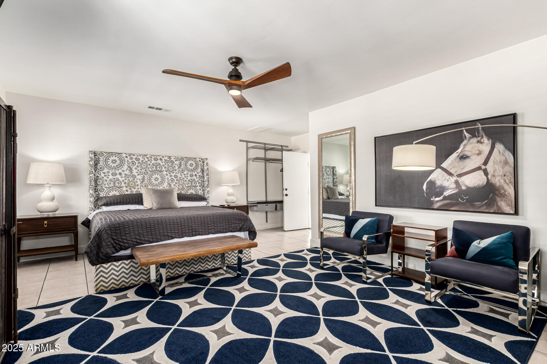 3809 North 35th Street Phoenix, AZ 85018 - Photo 22 of 43 a bedroom with a bed and wooden floor