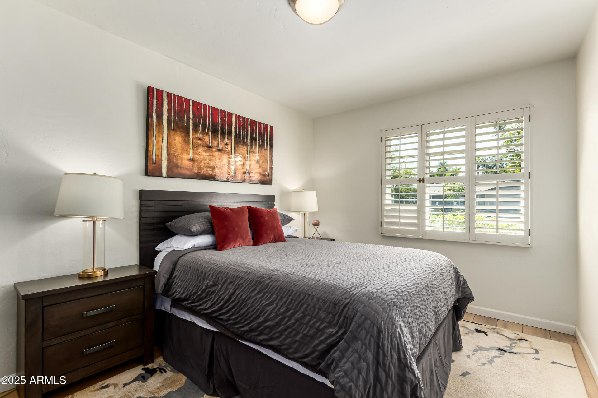 3809 North 35th Street Phoenix, AZ 85018 - Photo 23 of 43 a bedroom with a bed and a night stand