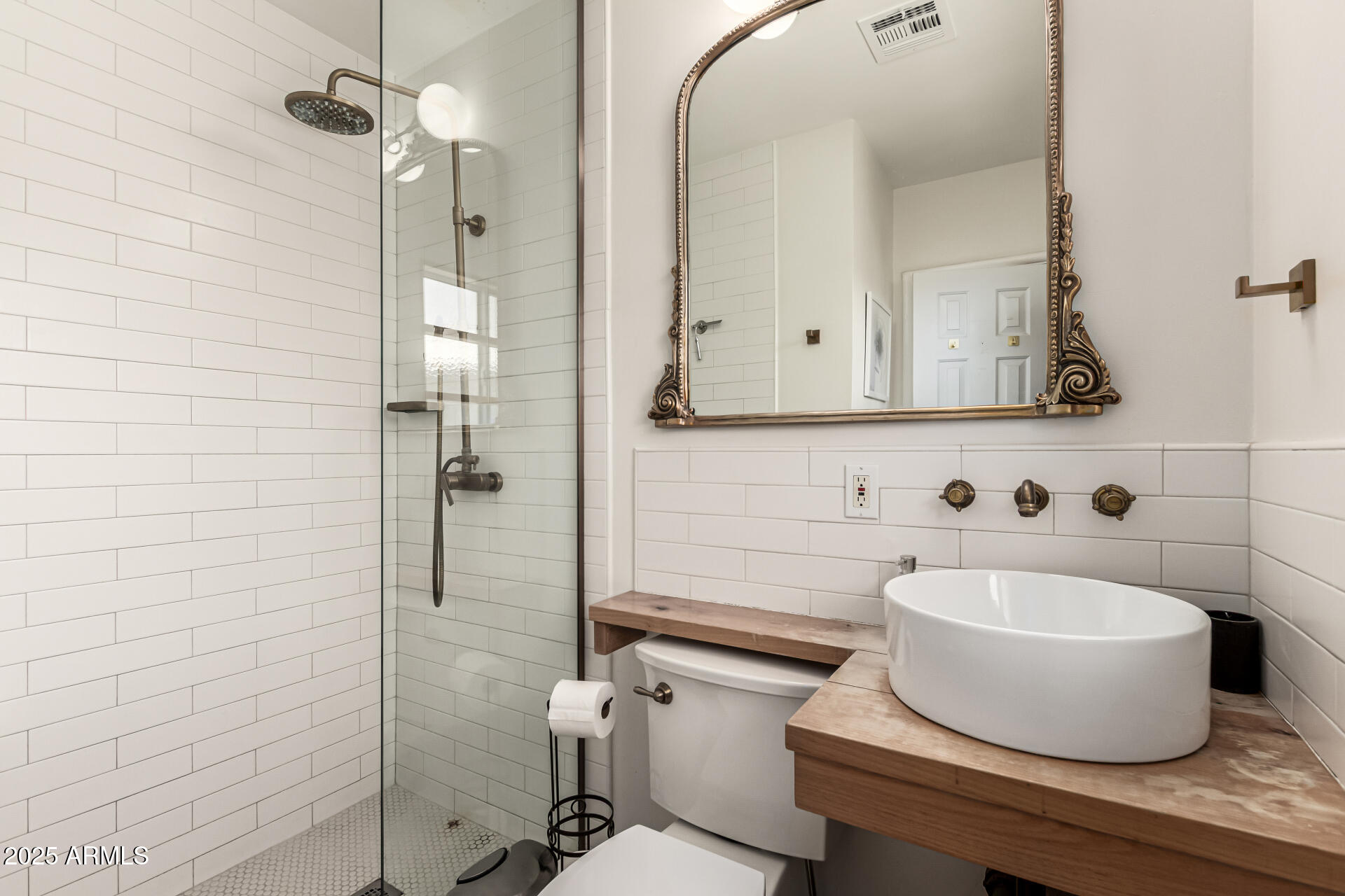 3809 North 35th Street Phoenix, AZ 85018 - Photo 32 of 43 a bathroom with a sink a toilet and shower