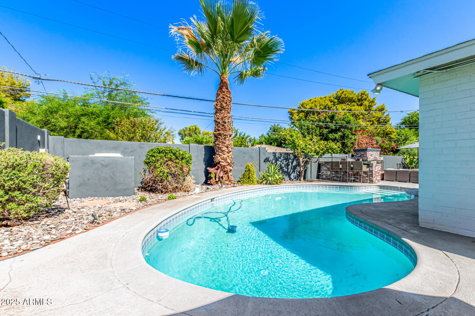 3809 North 35th Street Phoenix, AZ 85018 - Photo 34 of 43 a view of a swimming pool with a patio
