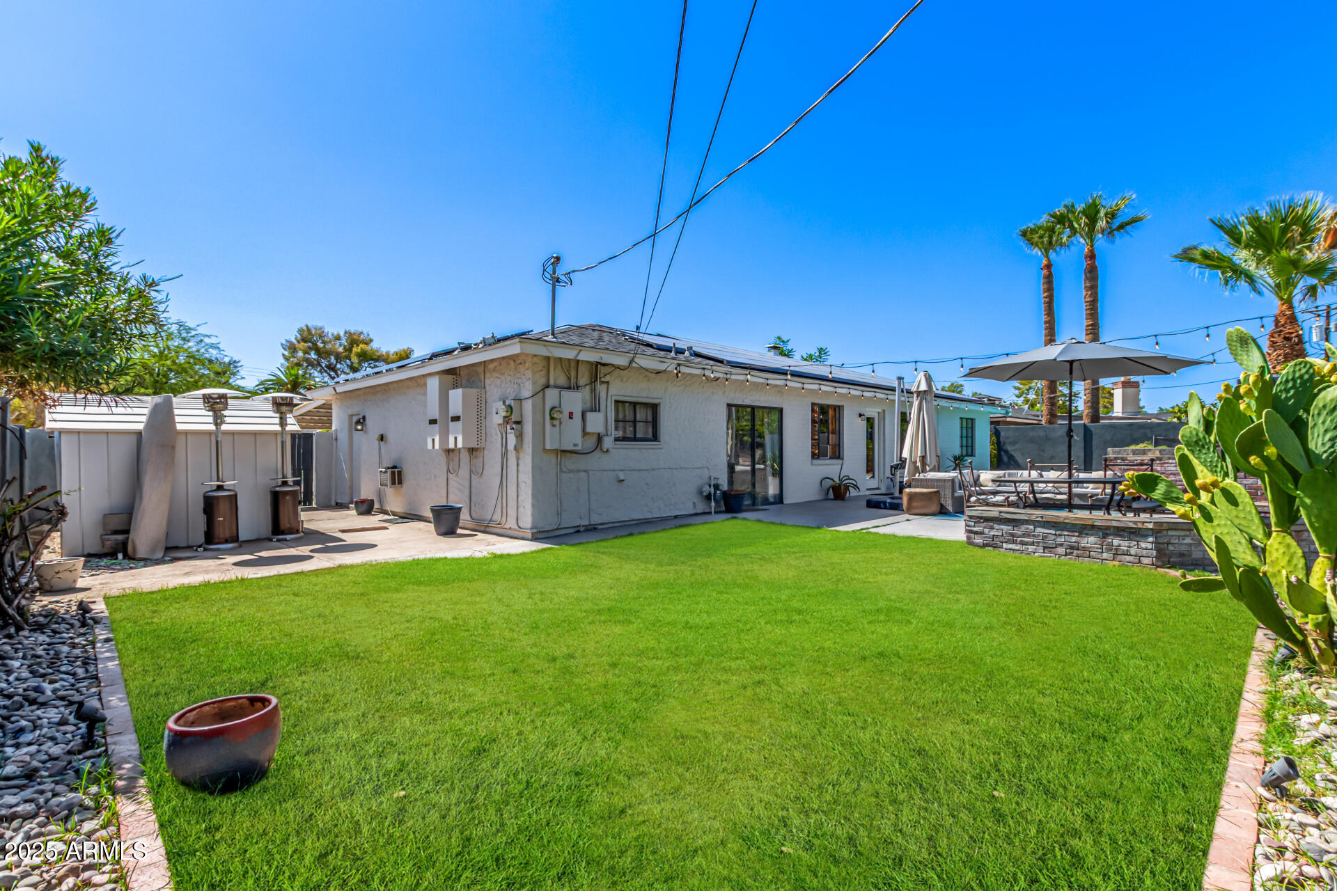 3809 North 35th Street Phoenix, AZ 85018 - Photo 39 of 43 a view of a house with backyard porch and garden