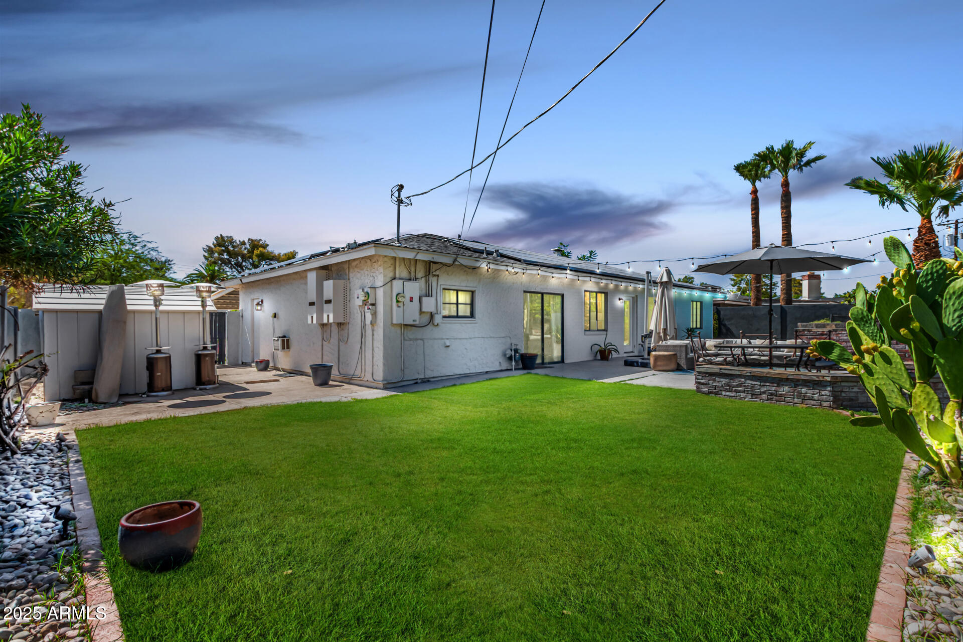 3809 North 35th Street Phoenix, AZ 85018 - Photo 43 of 43 a view of a house with backyard and sitting area