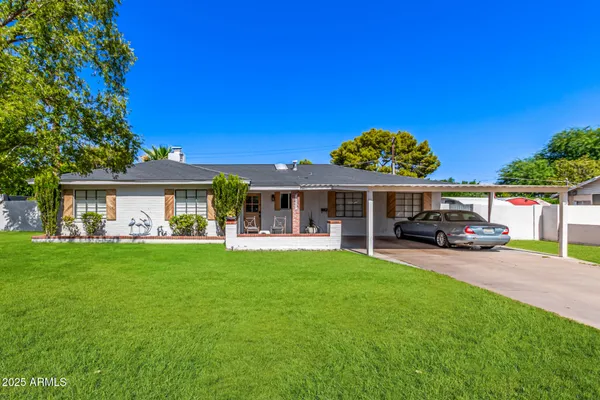 a view of a house with a garden