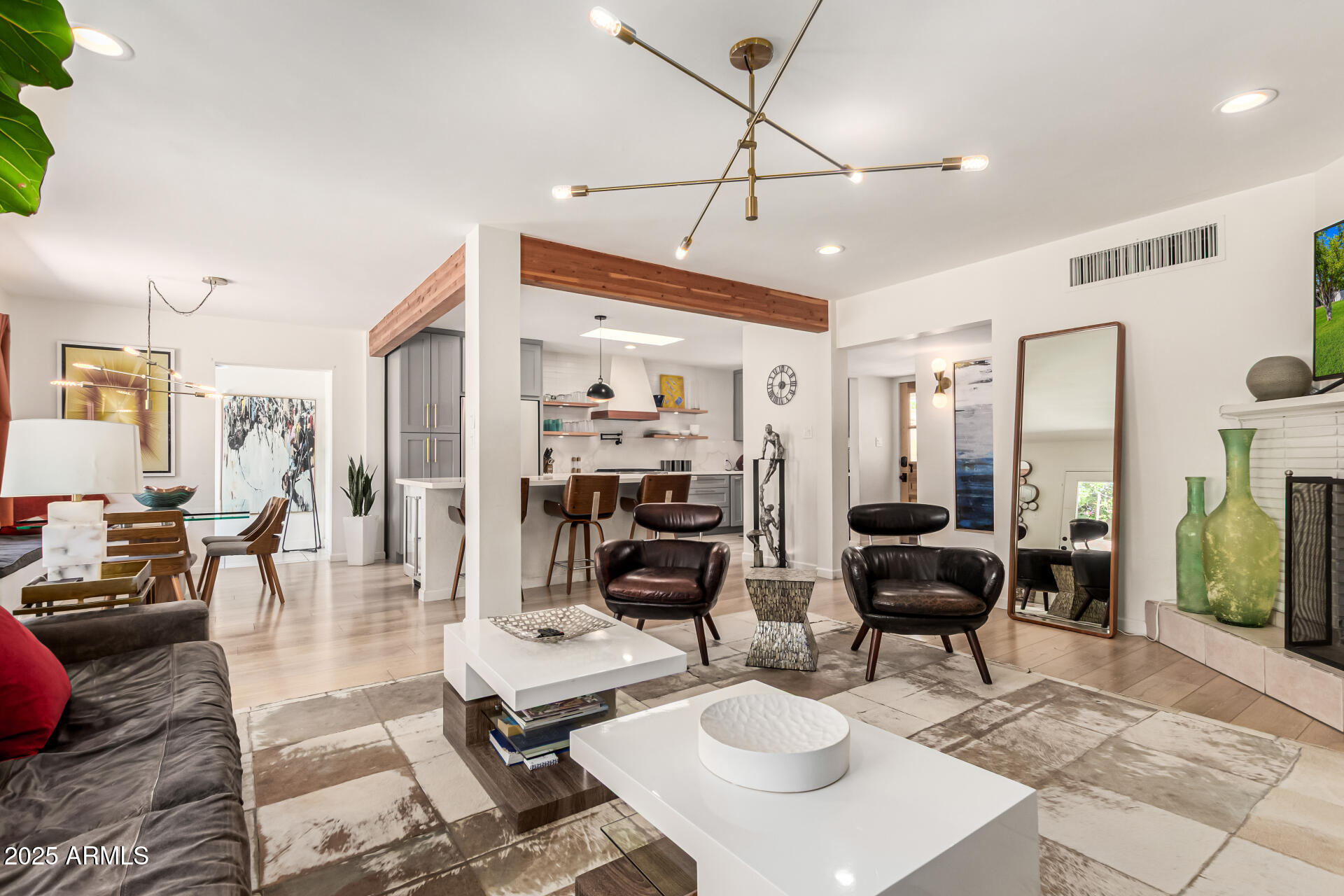 3809 North 35th Street Phoenix, AZ 85018 - Photo 10 of 43 a living room with furniture and wooden floor