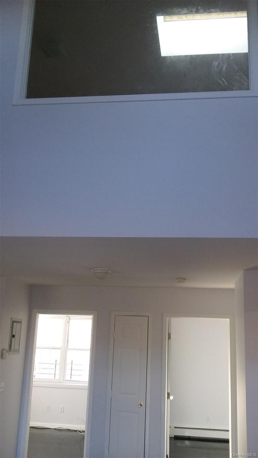 97-56 105th Street, Unit 2 Queens, NY 11416 - Photo 18 of 29 a view of kitchen and window