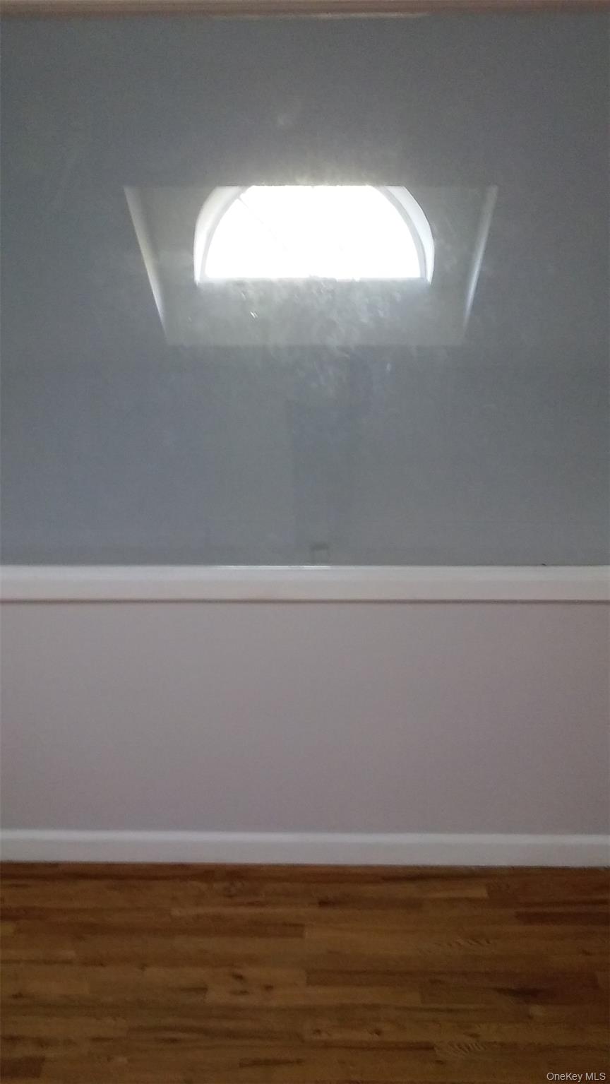 97-56 105th Street, Unit 2 Queens, NY 11416 - Photo 24 of 29 a view of a small space with a window