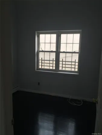 a view of a bathroom with a tub and toilet