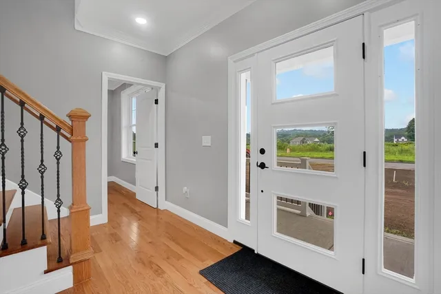 a view of an empty room with white walls