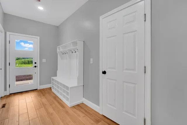 a view of room with window and ceiling fan