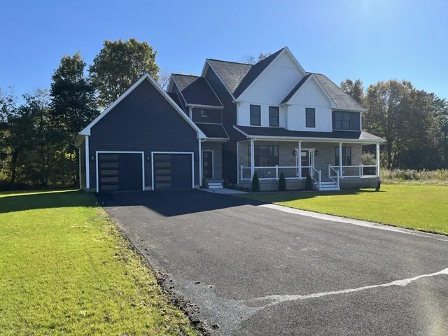 a house with swimming pool in front of it