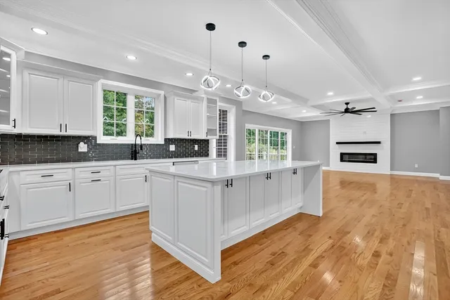 a view of entryway with wooden floor and stairs