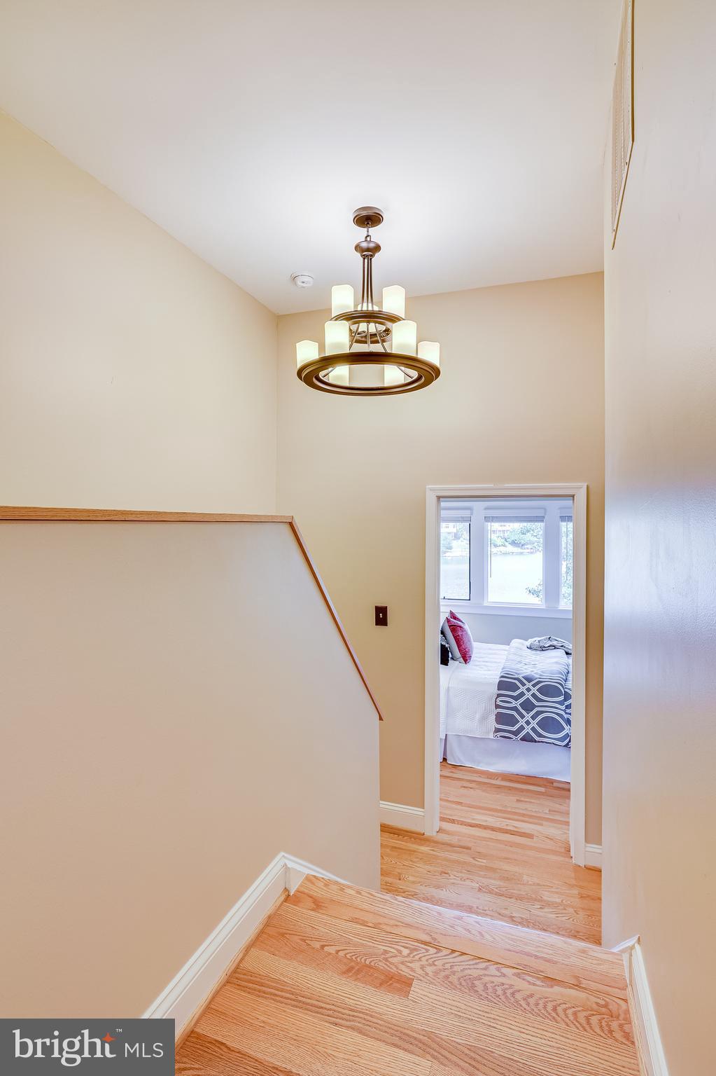 11056 Thrush Ridge Road Reston, VA 20191 - Photo 40 of 62 Hardwood stairs lead to the primary suite.