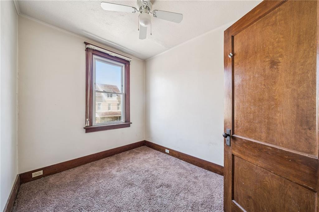 338 Catherine Street McKees Rocks, PA 15136 - Photo 21 of 25 an empty room with windows and closet