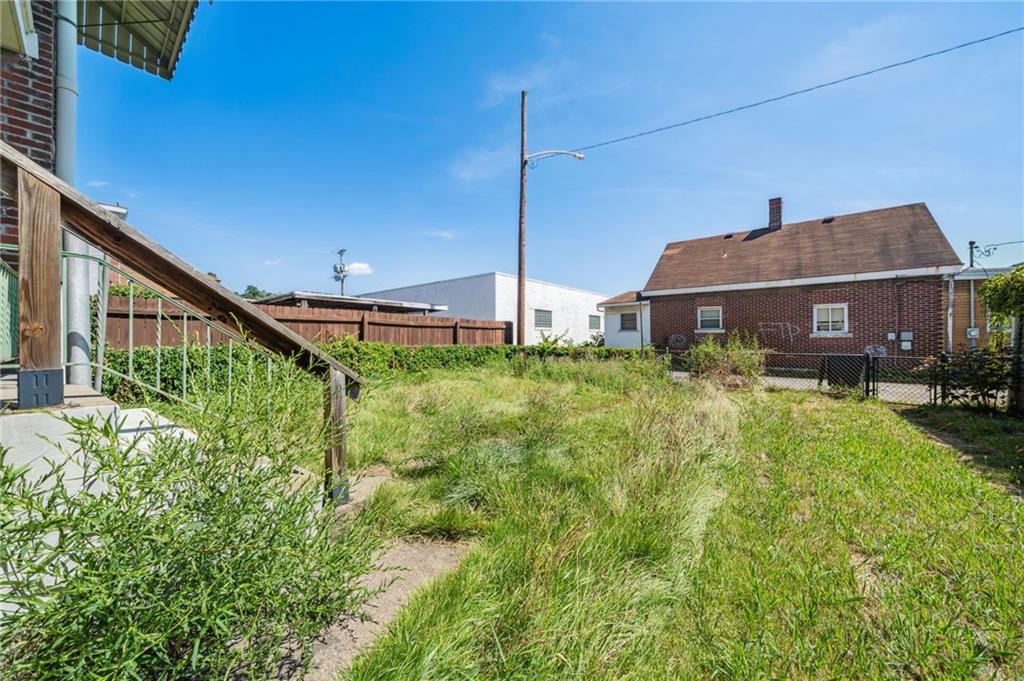 338 Catherine Street McKees Rocks, PA 15136 - Photo 24 of 25 a house view with a garden space