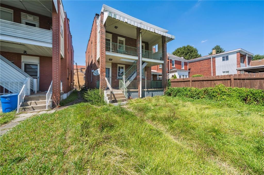 338 Catherine Street McKees Rocks, PA 15136 - Photo 25 of 25 a view of a house with a yard and sitting area