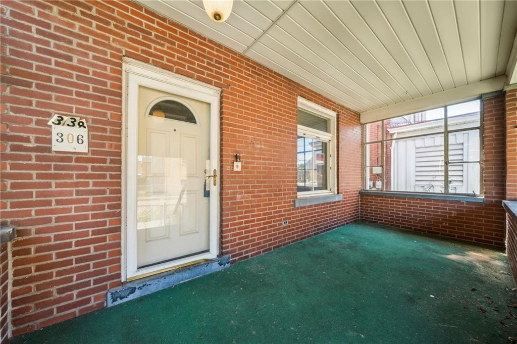 338 Catherine Street McKees Rocks, PA 15136 - Photo 3 of 25 a view of front door of house with yard