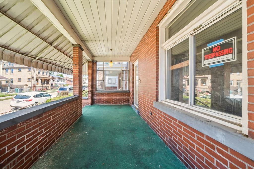 338 Catherine Street McKees Rocks, PA 15136 - Photo 4 of 25 a front view of a house with a yard