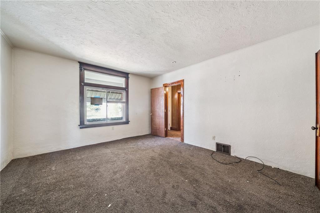 338 Catherine Street McKees Rocks, PA 15136 - Photo 6 of 25 an empty room with windows