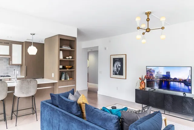 a living room with furniture and window